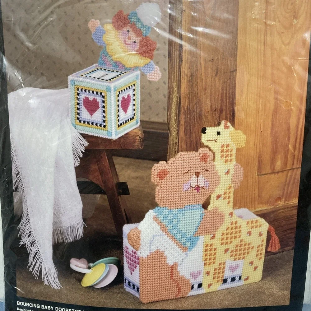 VTG/CIB Bucilla Plastic Canvas Bouncing Baby Doorstop w/Jack-In-The-Bank #6094